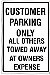 CUSTOMER PARKING ONLY ALL OTHERS TOWED AT OWNERS EXPENSE